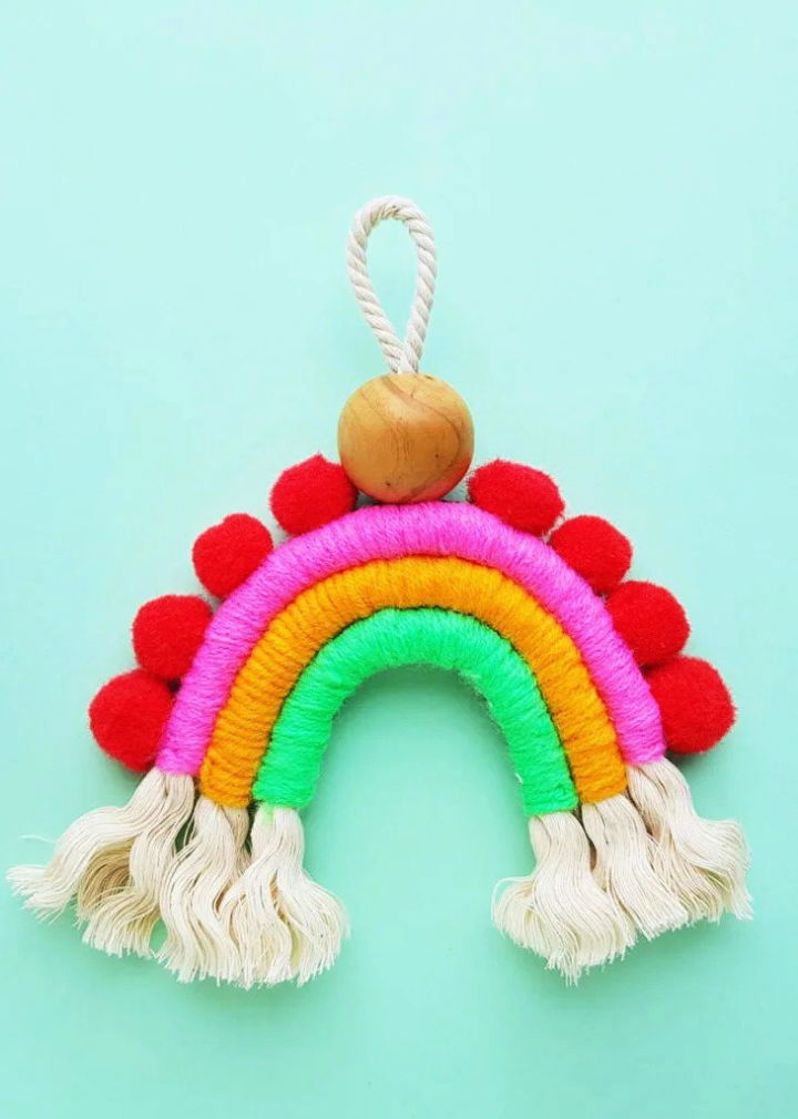 https://media.ialwayspickthethimble.com/wp-content/uploads/2023/04/Craft-a-Macrame-Rainbow.jpg