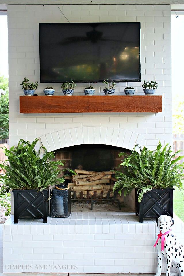 White Painted Brick Exterior Fireplace