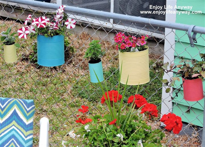 DIY Tin Can Fence Planters