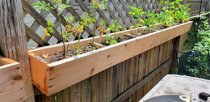 Easy DIY Cedar Fence Planters Idea