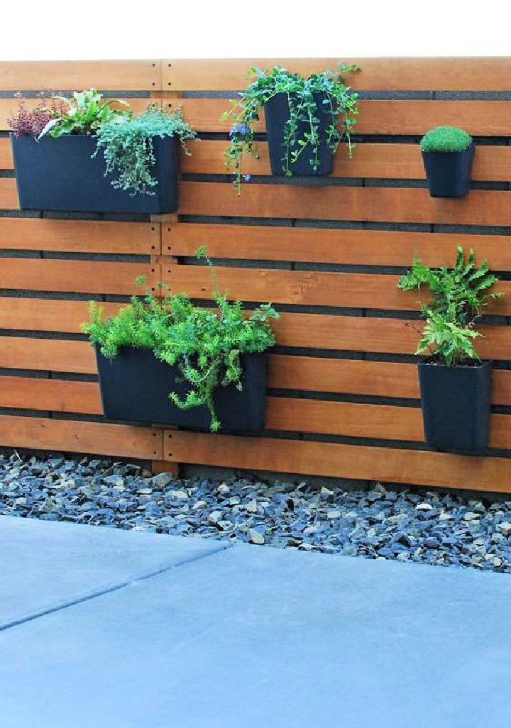 Wood Slat Garden Wall With Planters