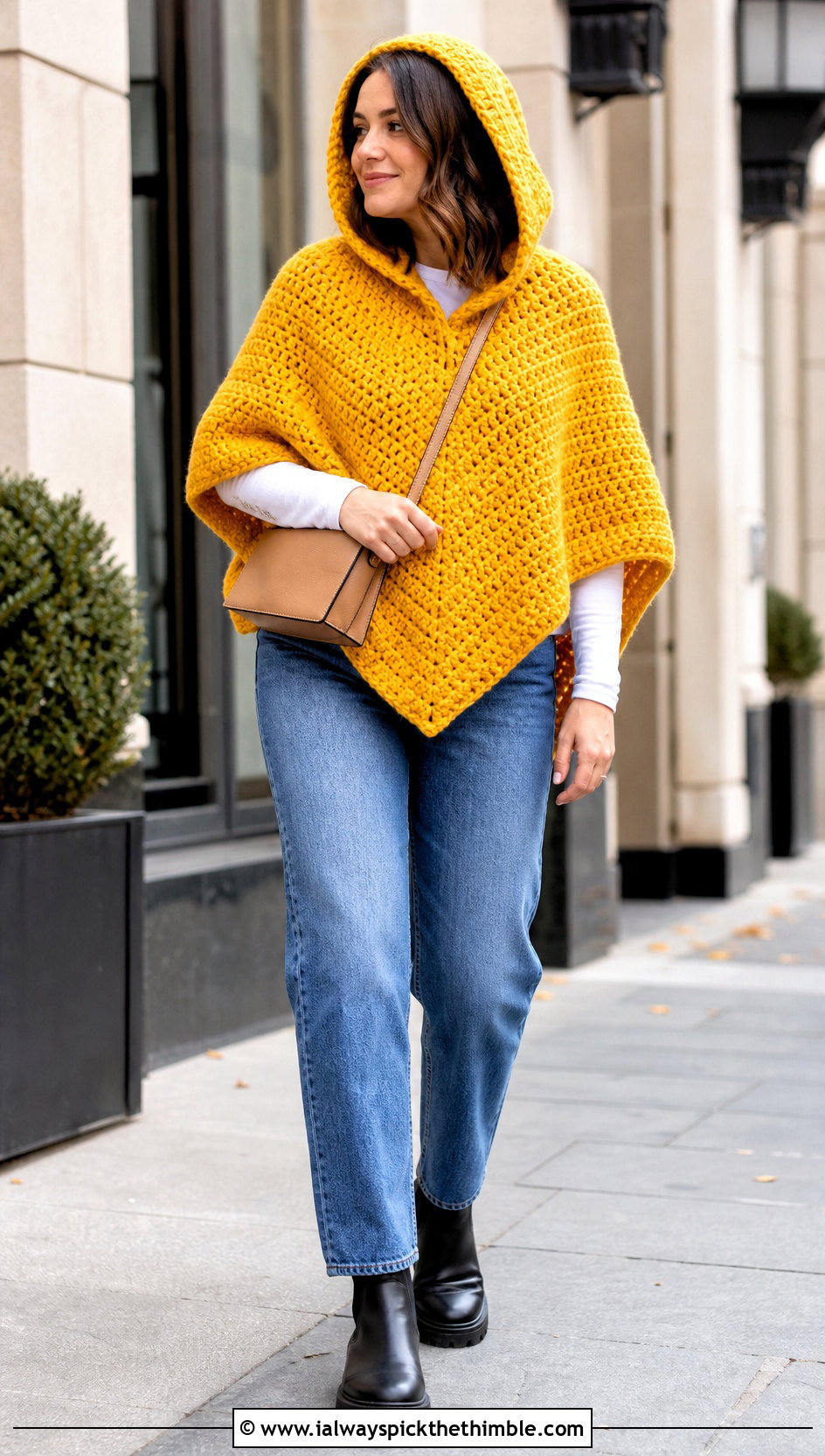 Chunky Crochet Hooded Poncho With Straight Leg Jeans - 25 Crochet Hooded Poncho outfit ideas