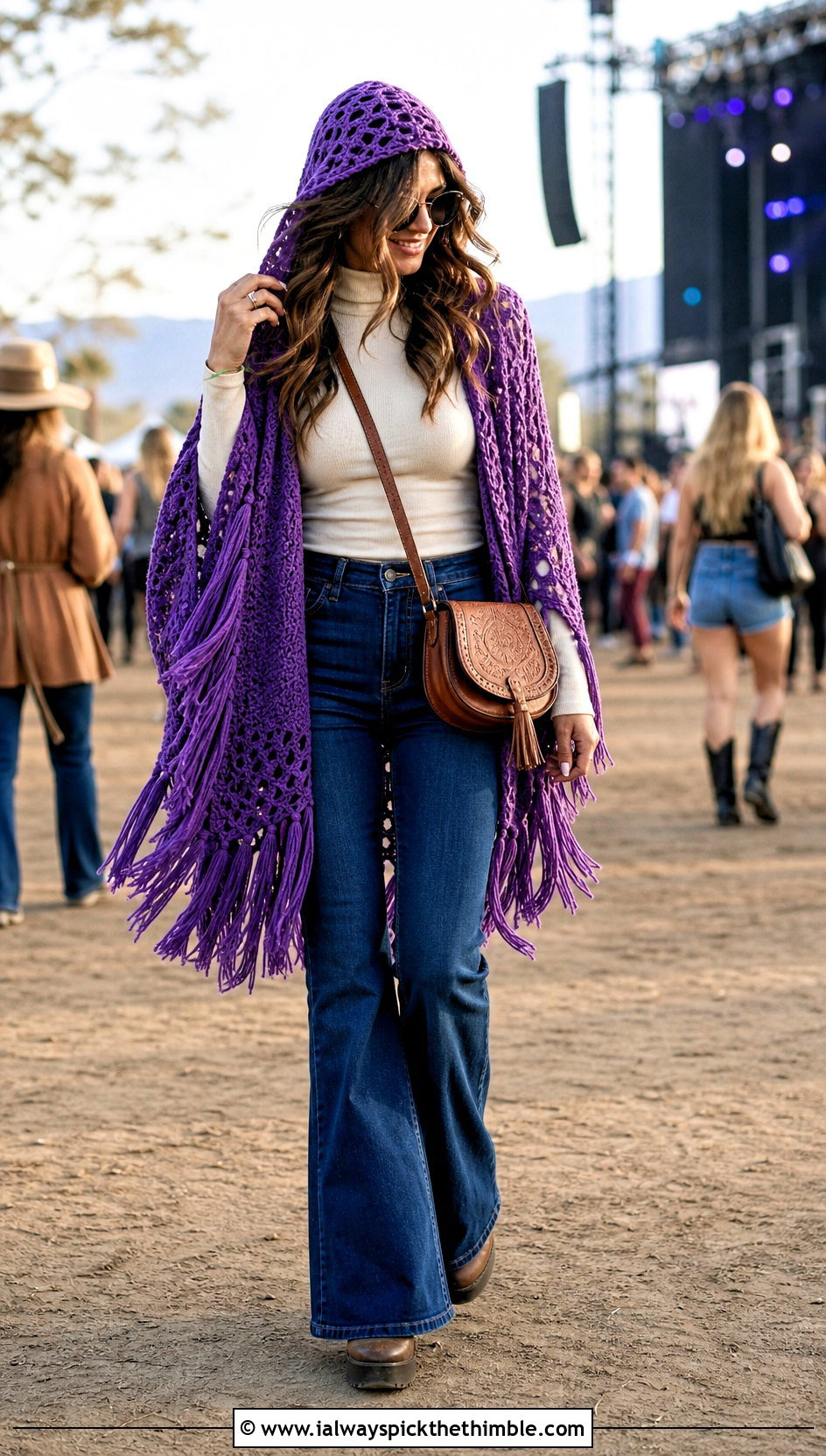Fringed Crochet Hooded Cape With Flared Jeans - 25 crochet hooded cape outfit ideas