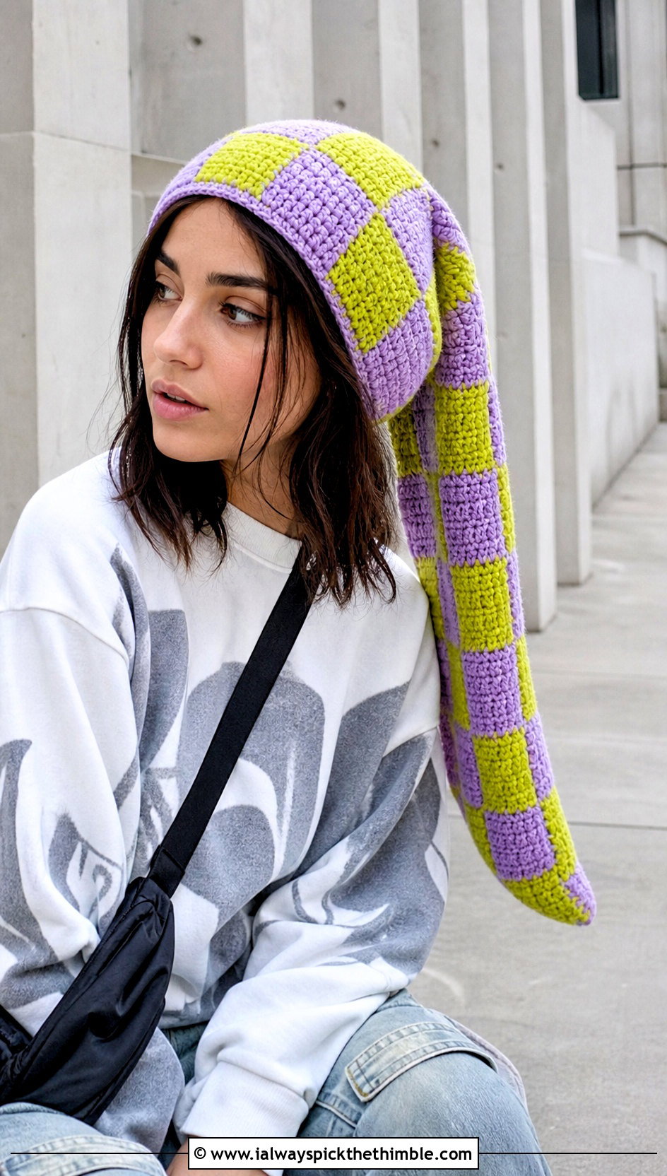 Long Checkerboard Crochet Hat With Graphic Sweatshirt - 20 Long Crochet Hat outfit ideas