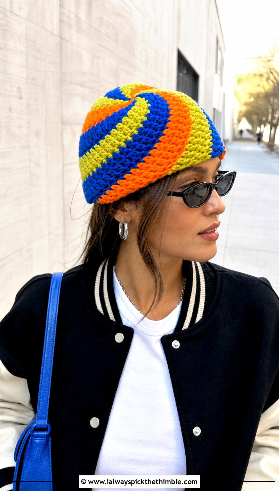 Spiral Candy Corn Crochet Beanie With Varsity Jacket - 15 candy corn crochet beanie outfit ideas