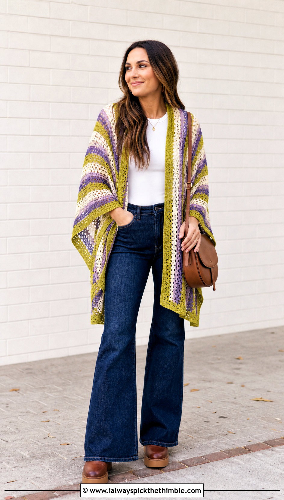 Striped Crochet Poncho With Flared Jeans - 25 easy crochet poncho woman outfit ideas